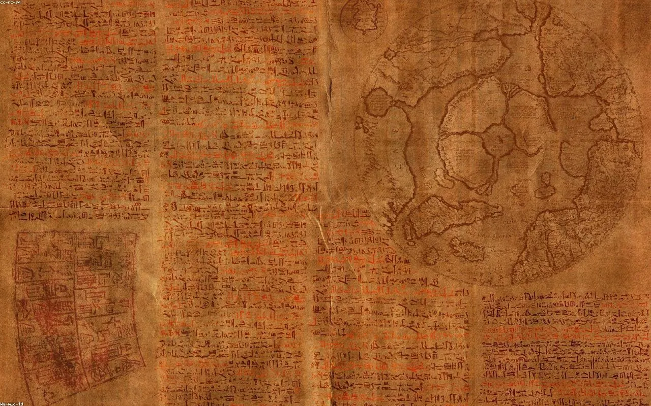 A weathered scroll on a wooden desk